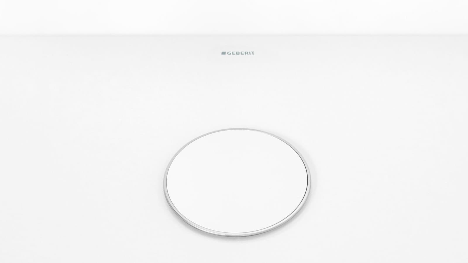 Afvoerkap in wit met discrete chroome rand Afvoerkap in wit met discrete chroome rand