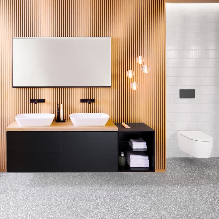 Twee opzetwastafel met een wastafelblad en onderkast Twee opzetwastafel met een wastafelblad en onderkast